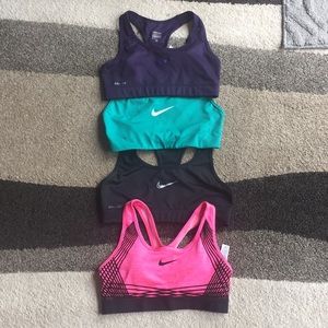 4 Nike sports bras- size small!